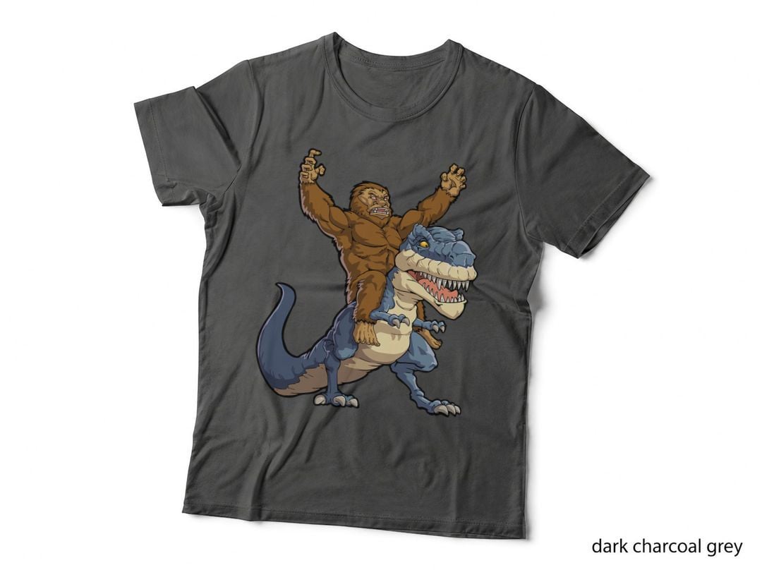 Bigfoot Riding Dinosaur T Rex Funny Men Boys Sasquatch Lover T-Shirt