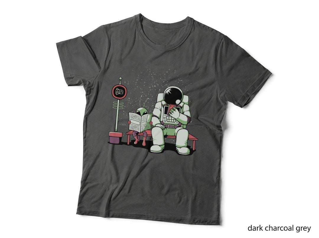 Astronaut in a Bus Stop Funny Alien Reading Newspaper by Tobe Fonseca T-Shirt