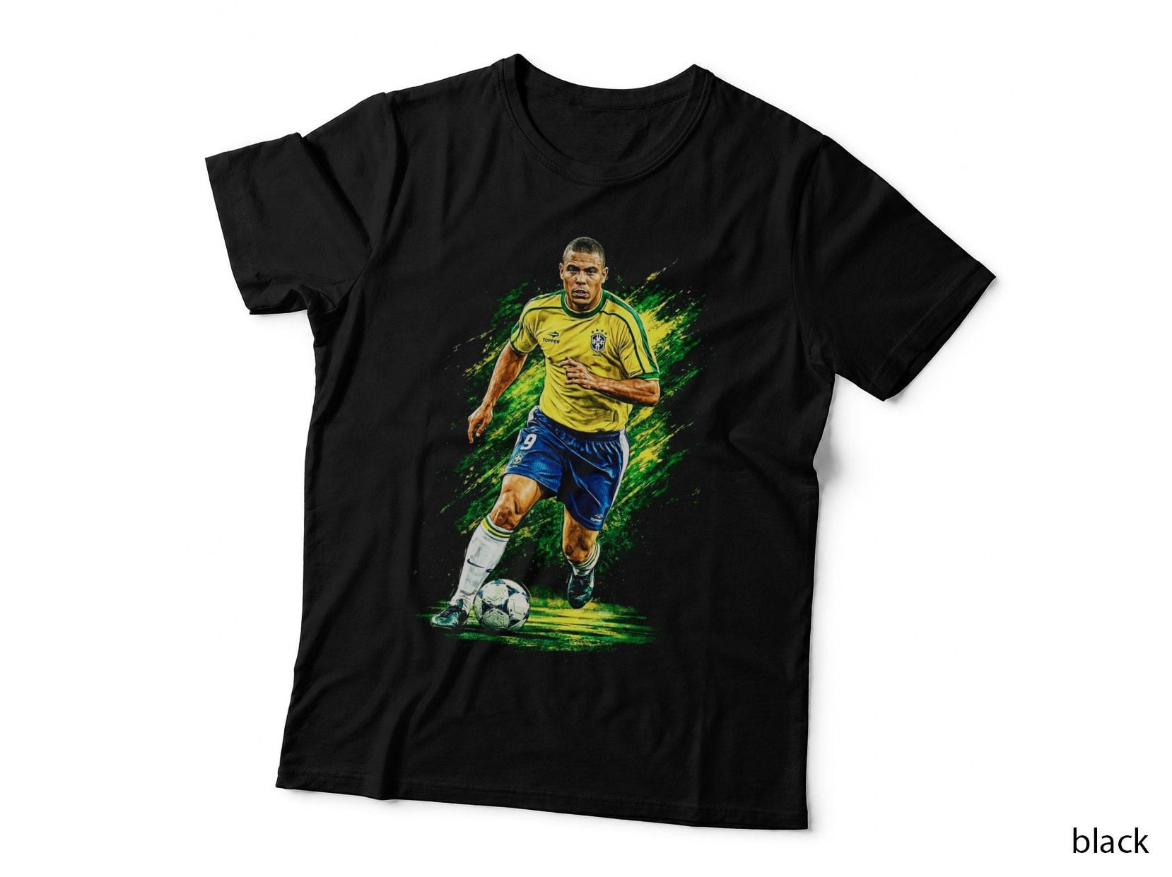 Brazil Footballer 9 Yellow Blue Kit Dribbling Ball on Grass Green Splash T-Shirt