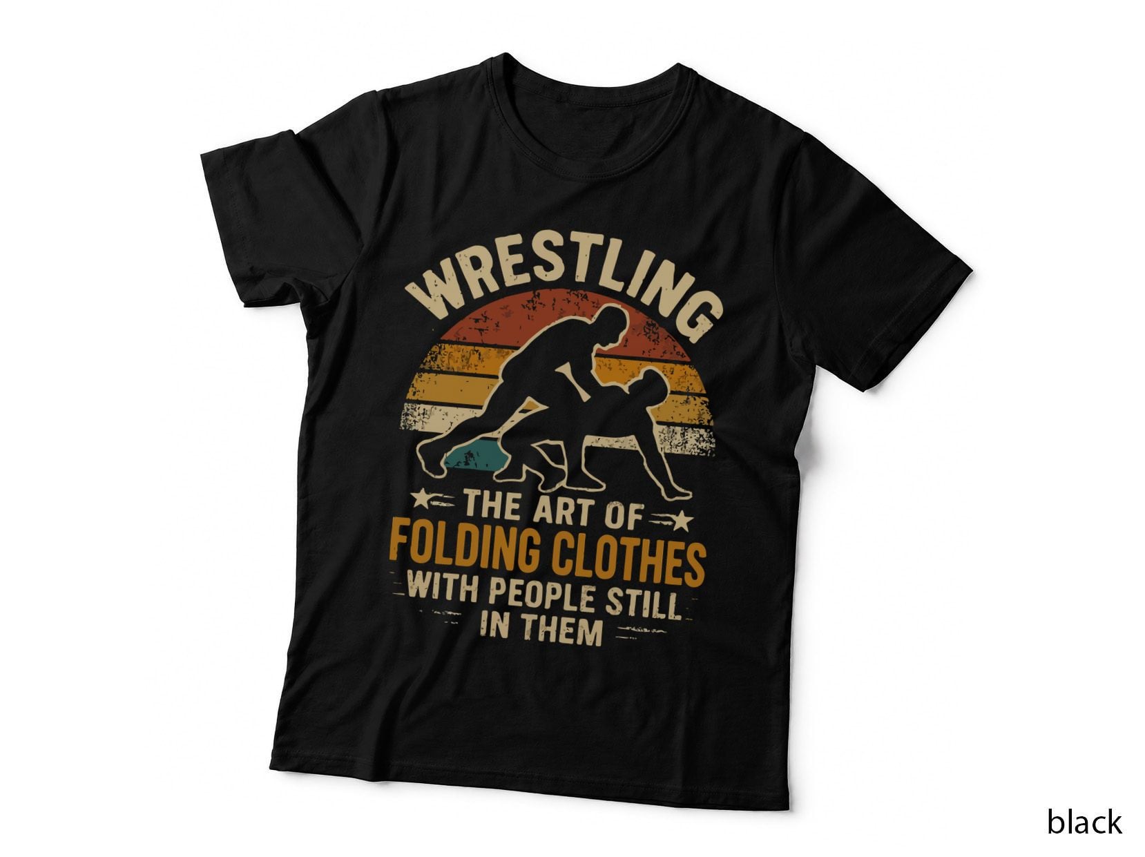 Wrestling the Art of Folding Clothes with People Still in Wrestling T-Shirt